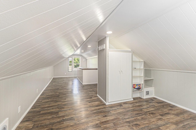 488 Roberts St, Muskegon, MI 49442 - bonus room featuring dark wood-style floors, baseboards, and lofted ceiling