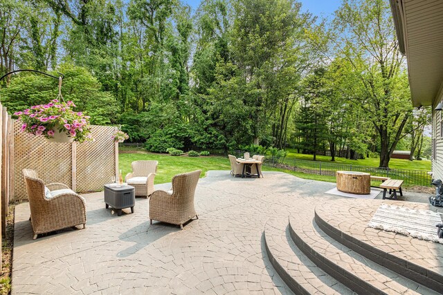 4844 Ontario Dr, Buchanan, MI 49107 - view of patio / terrace featuring view of wooded area and outdoor dining area