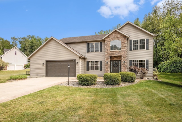 4844 Ontario Dr, Buchanan, MI 49107 - traditional home featuring a garage, concrete driveway, stone siding, and a front yard