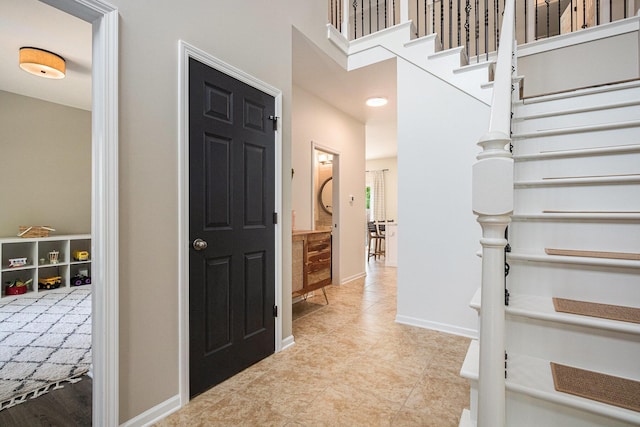 4844 Ontario Dr, Buchanan, MI 49107 - entryway featuring stairway and light tile patterned floors