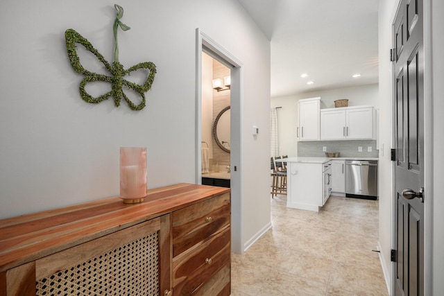 4844 Ontario Dr, Buchanan, MI 49107 - hallway with recessed lighting and light tile patterned floors