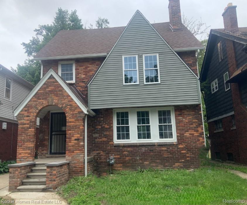 16533 Parkside St, Detroit, MI 48221 - tudor home featuring brick siding and a chimney