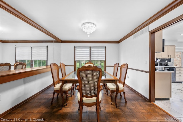 29801 Deer Run, Farmington Hills, MI 48331 - dining area with baseboards, healthy amount of natural light, crown molding, and a chandelier