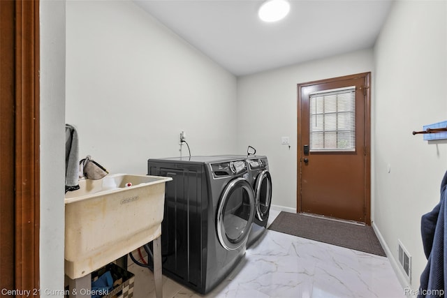 29801 Deer Run, Farmington Hills, MI 48331 - laundry area with washing machine and clothes dryer, light marble finish floors, and baseboards