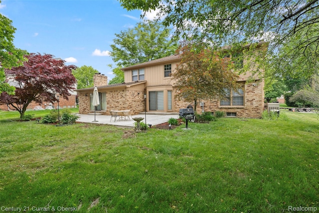 29801 Deer Run, Farmington Hills, MI 48331 - back of property featuring a patio, a lawn, a chimney, and brick siding