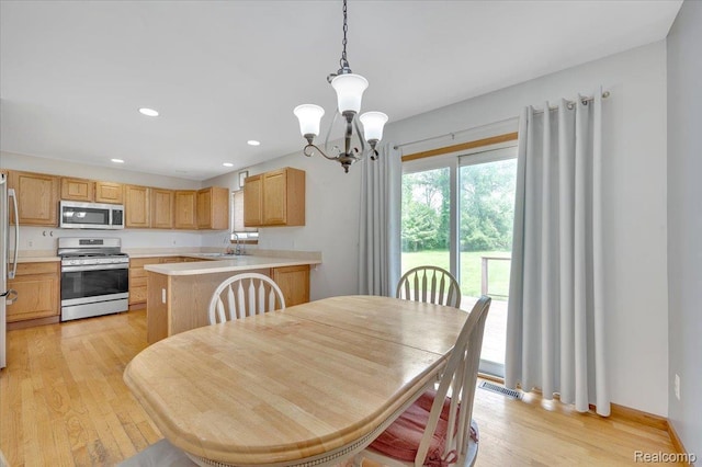 38 Melvin J Ct, Oxford, MI 48371 - dining area featuring a chandelier, light wood-style floors, and recessed lighting