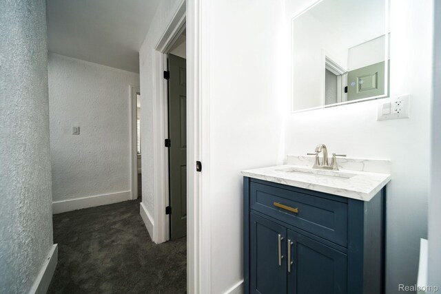 16240 Washburn St, Detroit, MI 48221 - bathroom featuring vanity, baseboards, and a textured wall