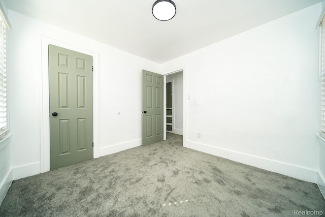 16240 Washburn St, Detroit, MI 48221 - unfurnished bedroom with carpet flooring and baseboards