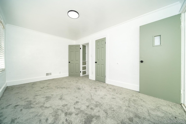 16240 Washburn St, Detroit, MI 48221 - unfurnished bedroom with carpet floors, ornamental molding, and baseboards