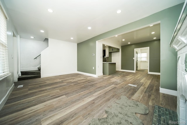 16240 Washburn St, Detroit, MI 48221 - unfurnished living room featuring stairway, wood finished floors, baseboards, and recessed lighting