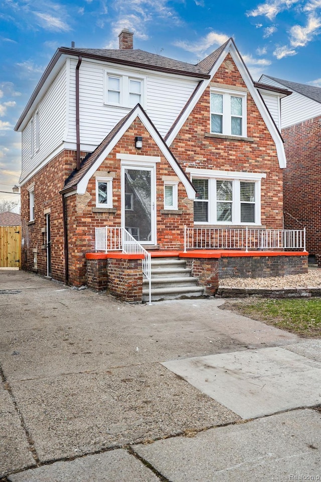 16240 Washburn St, Detroit, MI 48221 - view of front of property featuring a chimney and brick siding
