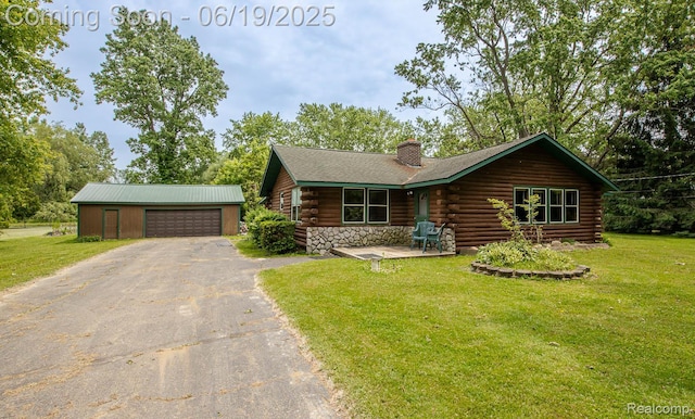 5180 Hillsboro Rd, Davisburg, MI 48350 - log cabin with log siding, an outbuilding, a chimney, and a front yard