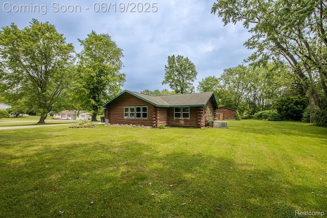 5180 Hillsboro Rd, Davisburg, MI 48350 - log cabin with log siding and a front lawn