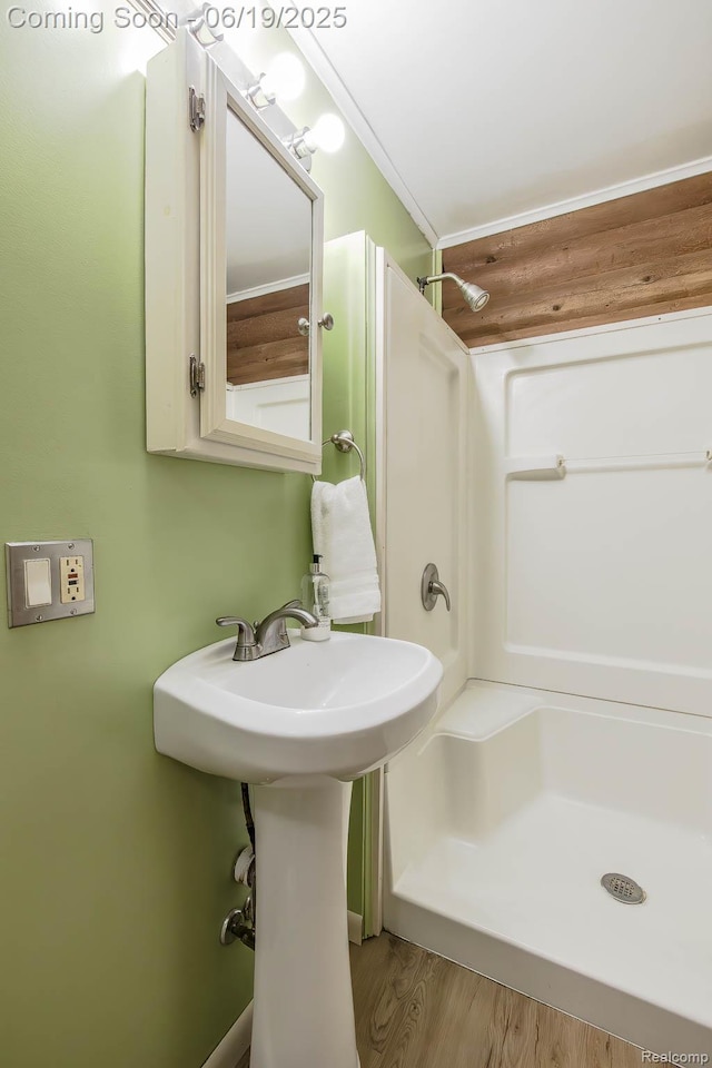 5180 Hillsboro Rd, Davisburg, MI 48350 - full bathroom featuring a shower and wood finished floors