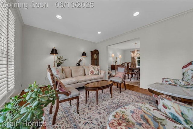 2861 Whittier Dr, Bloomfield Hills, MI 48304 - living area with crown molding, a chandelier, wood finished floors, and recessed lighting