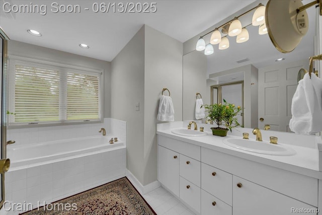 2861 Whittier Dr, Bloomfield Hills, MI 48304 - bathroom with double vanity, a garden tub, tile patterned floors, and recessed lighting