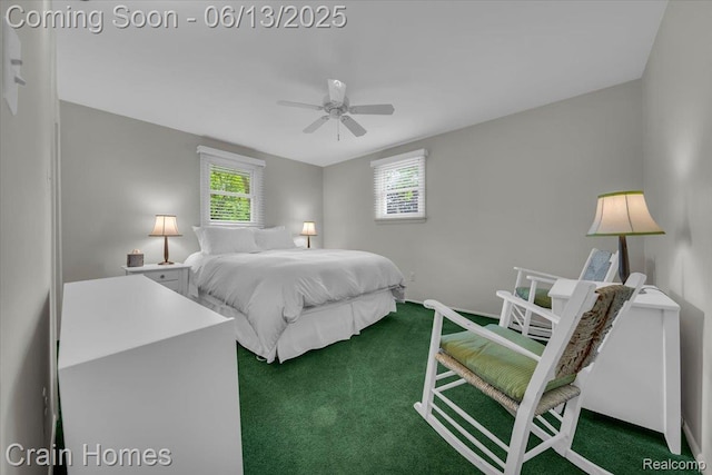 2861 Whittier Dr, Bloomfield Hills, MI 48304 - bedroom featuring dark colored carpet, multiple windows, and ceiling fan