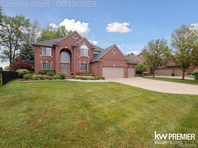18961 Pine Ln, Macomb, MI 48042 - view of front of home featuring brick siding, an attached garage, and concrete driveway