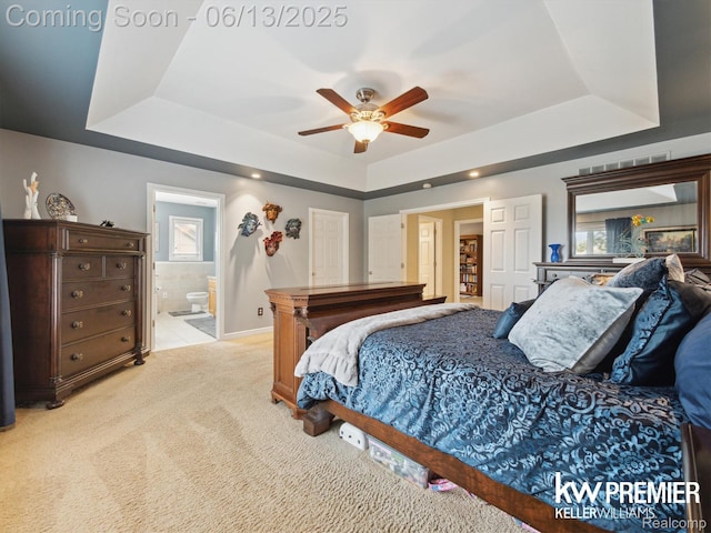 18961 Pine Ln, Macomb, MI 48042 - bedroom featuring a raised ceiling, light colored carpet, connected bathroom, and ceiling fan