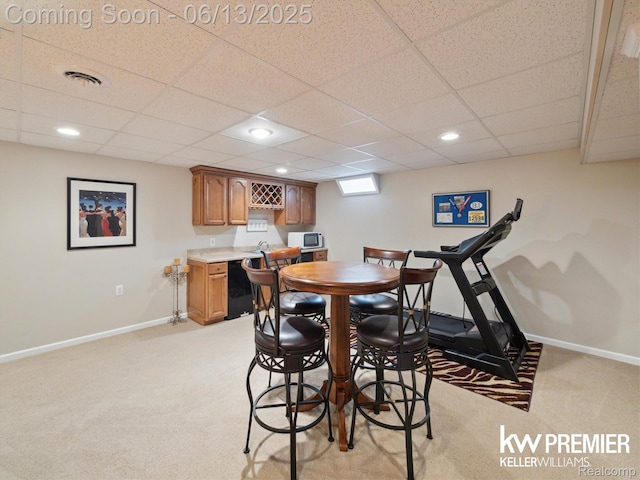 18961 Pine Ln, Macomb, MI 48042 - dining area featuring light colored carpet, wet bar, a drop ceiling, and recessed lighting