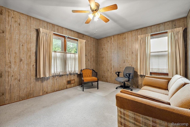 2652 Buckingham Ave, Berkley, MI 48072 - sitting room featuring carpet flooring, a ceiling fan, and wooden walls