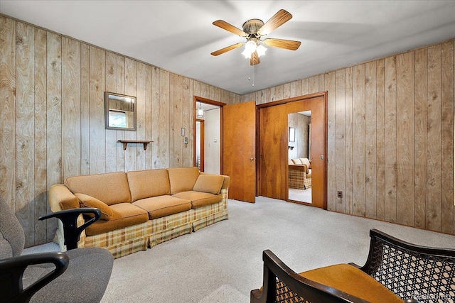 2652 Buckingham Ave, Berkley, MI 48072 - carpeted living room featuring a ceiling fan and wooden walls