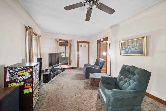 2016 Pringle Ave, Jackson, MI 49203 - living room with ceiling fan, carpet floors, and baseboards