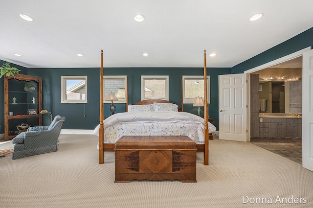 12571 Westwood Ln, Wayland, MI 49348 - carpeted bedroom with recessed lighting and ensuite bath