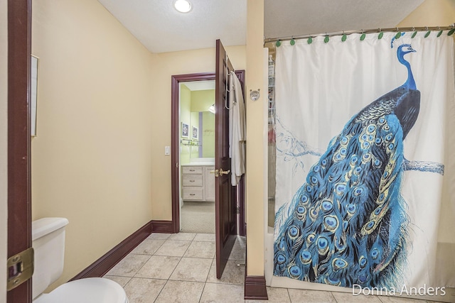 12571 Westwood Ln, Wayland, MI 49348 - bathroom with vanity, a shower with shower curtain, and tile patterned flooring