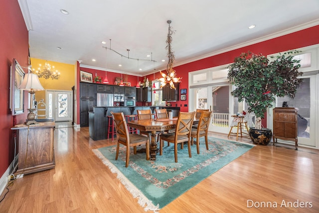 12571 Westwood Ln, Wayland, MI 49348 - dining area with a chandelier, light wood-style flooring, french doors, crown molding, and recessed lighting