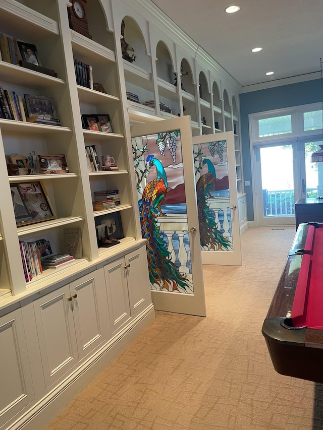 12571 Westwood Ln, Wayland, MI 49348 - corridor with light carpet, french doors, recessed lighting, and built in shelves