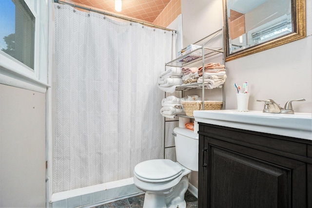 518 Hill Rd, Marshall, MI 49068 - full bath with toilet, vanity, a shower with shower curtain, and baseboards