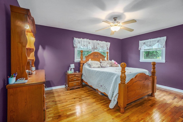 518 Hill Rd, Marshall, MI 49068 - bedroom with light wood-type flooring, ceiling fan, and baseboards