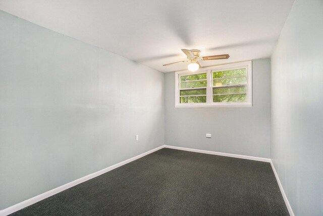 518 Hill Rd, Marshall, MI 49068 - unfurnished room with ceiling fan, dark colored carpet, and baseboards
