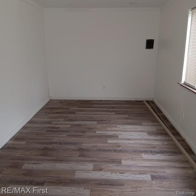 13500 Heyden St, Detroit, MI 48223 - unfurnished room featuring wood finished floors, ornamental molding, and baseboards