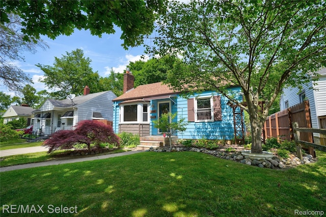 3418 Gratiot Ave, Flint, MI 48503 - view of front of home featuring a chimney
