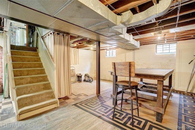 3418 Gratiot Ave, Flint, MI 48503 - below grade area with light wood-style floors and stairs