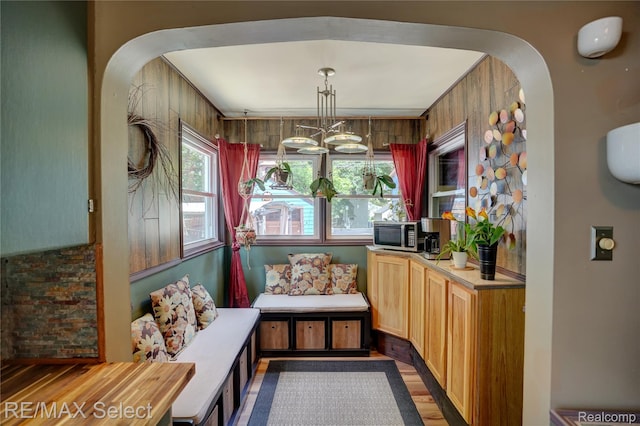 3418 Gratiot Ave, Flint, MI 48503 - dining space featuring arched walkways and wood finished floors