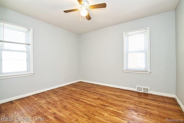 8035 Pinehurst St, Detroit, MI 48204 - spare room with light wood-style flooring and a ceiling fan