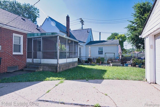 8035 Pinehurst St, Detroit, MI 48204 - view of yard with a sunroom and a patio