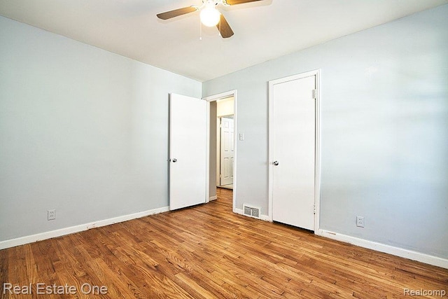 8035 Pinehurst St, Detroit, MI 48204 - unfurnished bedroom featuring wood finished floors and a ceiling fan
