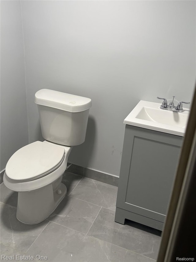 8035 Pinehurst St, Detroit, MI 48204 - bathroom featuring vanity and marble finish flooring