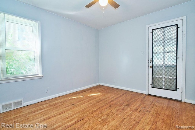 8035 Pinehurst St, Detroit, MI 48204 - spare room with light wood finished floors and a ceiling fan