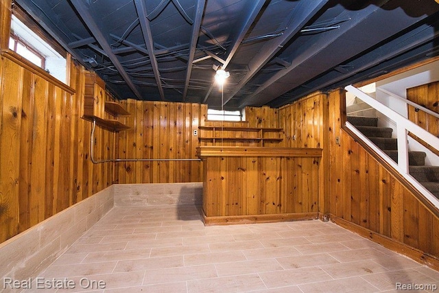 8035 Pinehurst St, Detroit, MI 48204 - basement featuring wooden walls, stairway, and bar