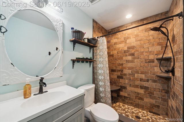9808 Crofoot Rd, Fowlerville, MI 48836 - bathroom featuring vanity, a tile shower, and recessed lighting