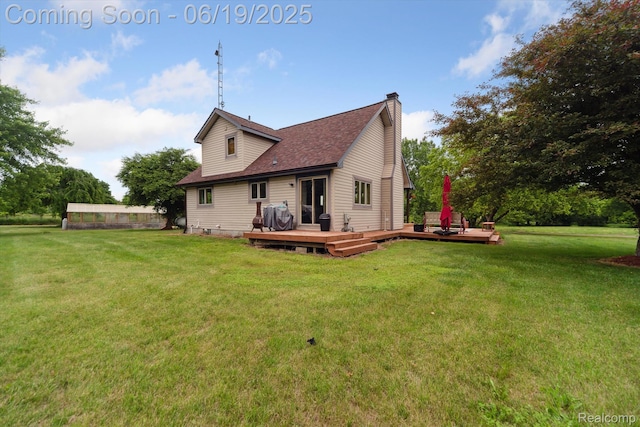 9808 Crofoot Rd, Fowlerville, MI 48836 - rear view of property with a wooden deck, a chimney, a yard, and a shingled roof