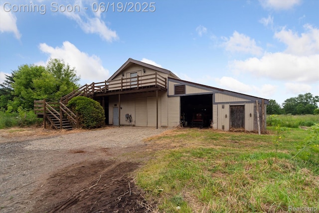9808 Crofoot Rd, Fowlerville, MI 48836 - view of outbuilding featuring stairs