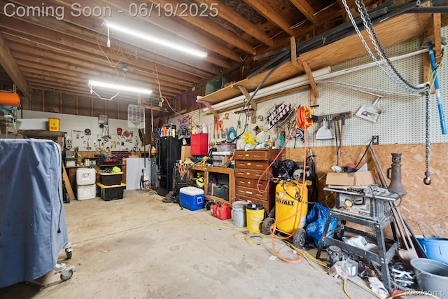9808 Crofoot Rd, Fowlerville, MI 48836 - garage with a workshop area