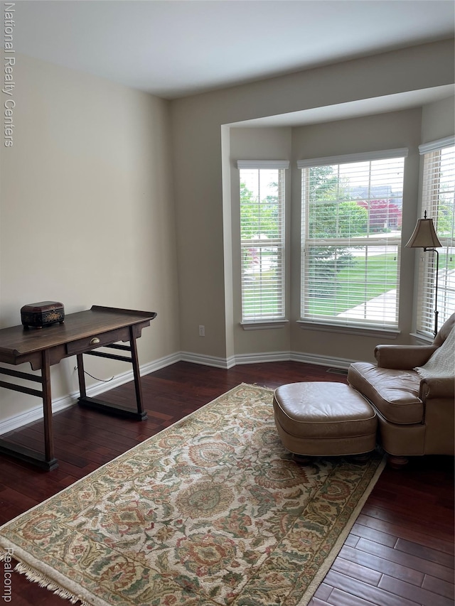 2750 Castlemartin Ct, Oakland, MI 48306 - living area featuring dark wood-style flooring and baseboards