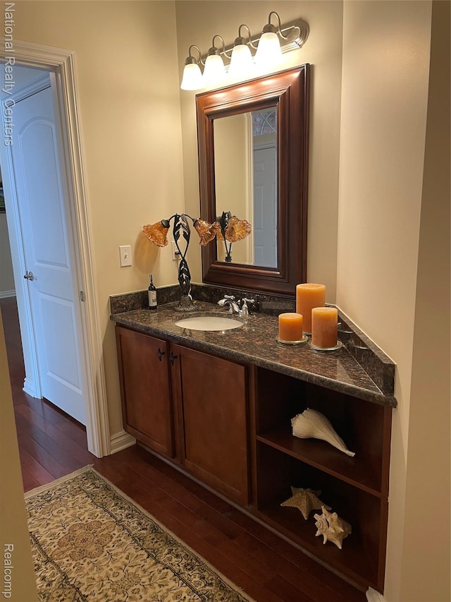 2750 Castlemartin Ct, Oakland, MI 48306 - bathroom with hardwood / wood-style flooring, vanity, and baseboards
